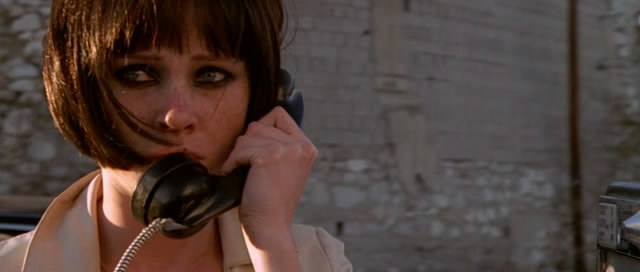 Valentina makes a call, orders a Hawaiian, and then hangs up.