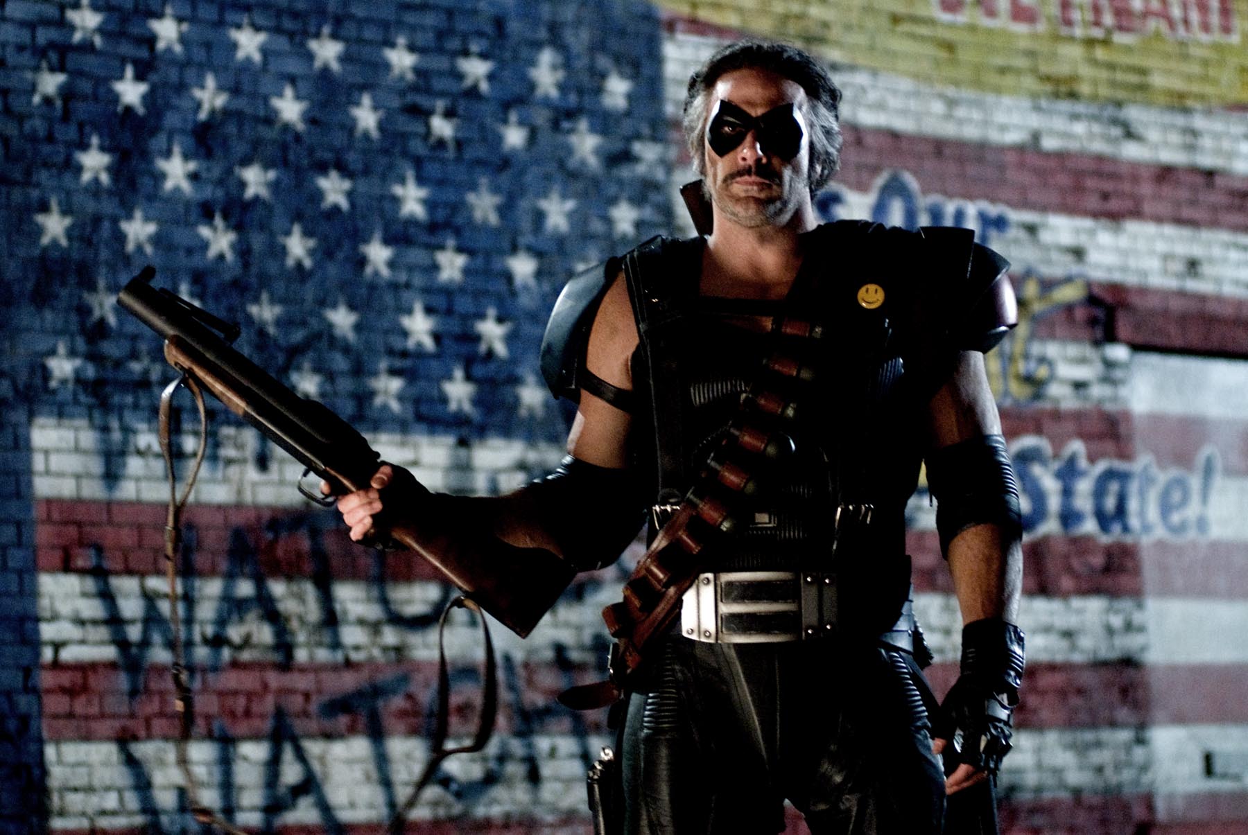 The Comedian liked to carry guns. Why that is, we may never know. 