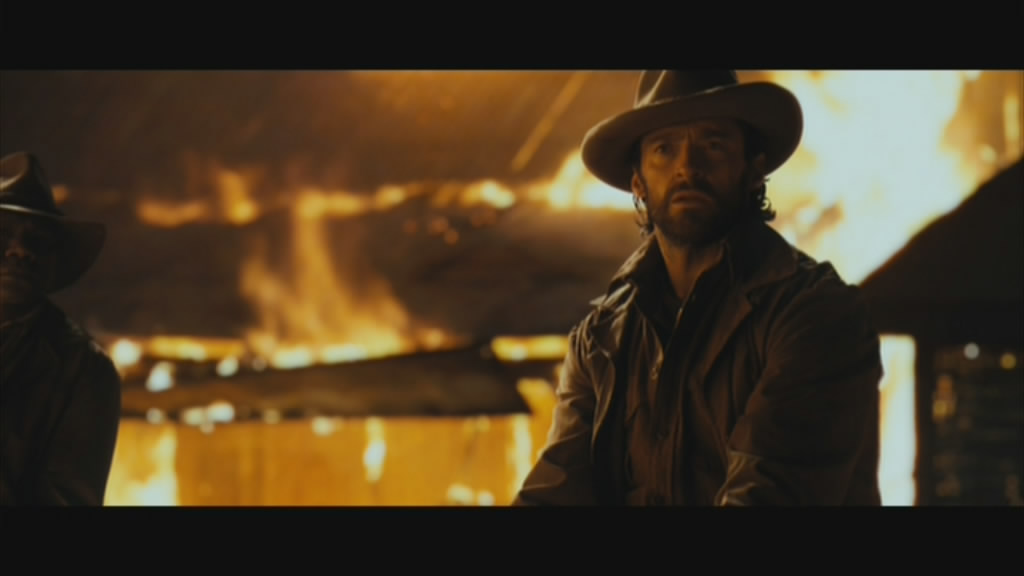 Hugh Jackman in full hero pose.