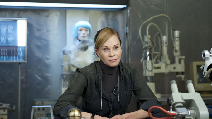 The robot has a more lifelike face.