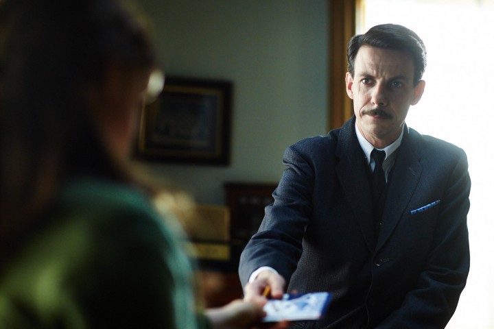Handing in his "Creepy Man" paperwork.
