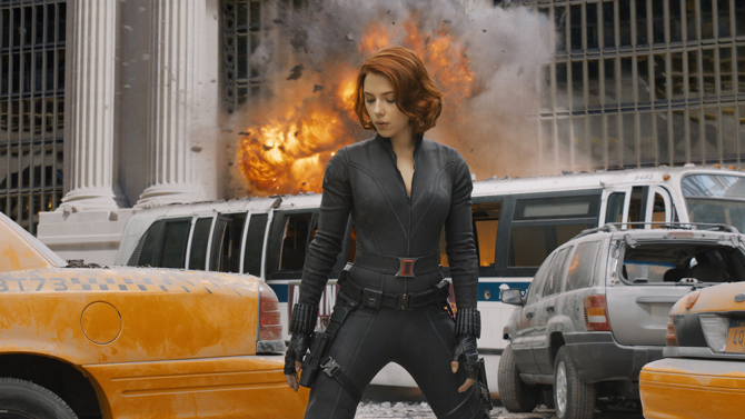 Women always look better with an explosion behind them.