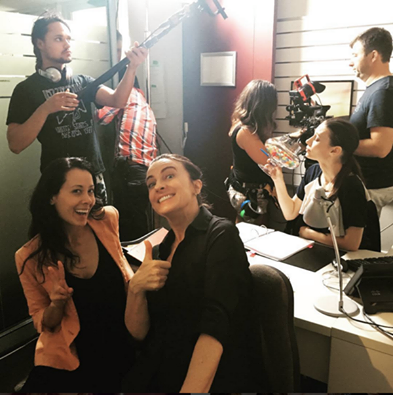 Rosie Lourde (L), Gretel Killeen (C) and Lauren Orrell (rear, drinking a glass of M&M's) on the set of Starting From Now.